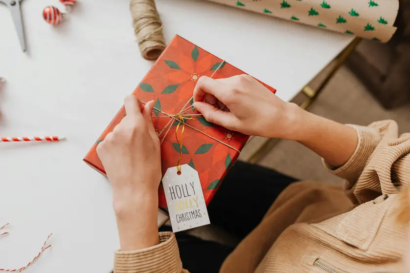 Image of an employee opening a gift