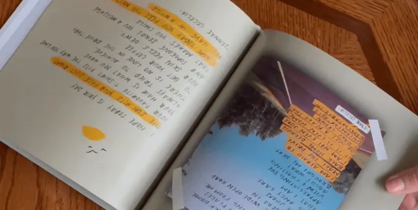 image of a person hold a photo book
