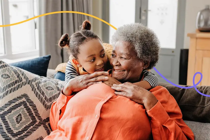 An image of a grandma and granddaughter hugging.