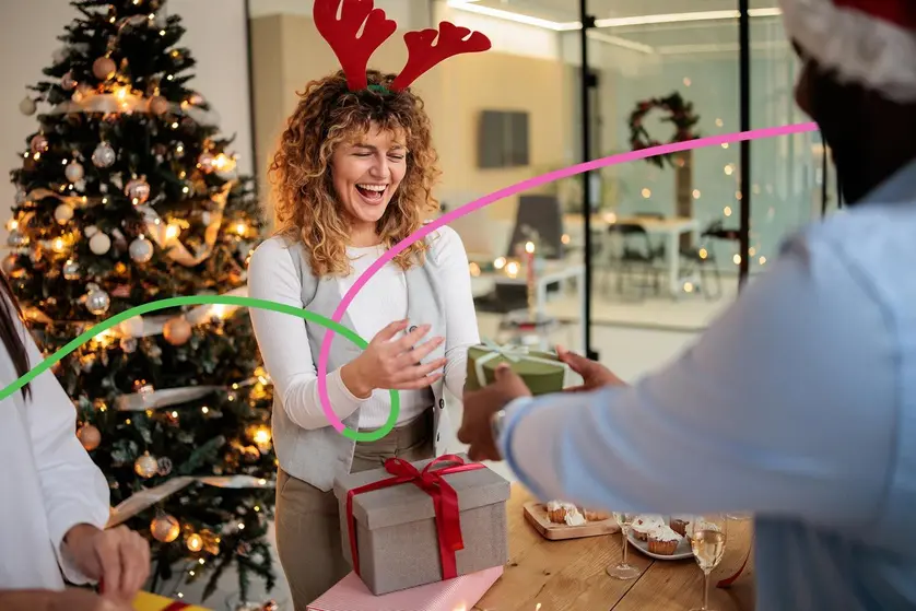 An image of coworkers exchanging gifts.