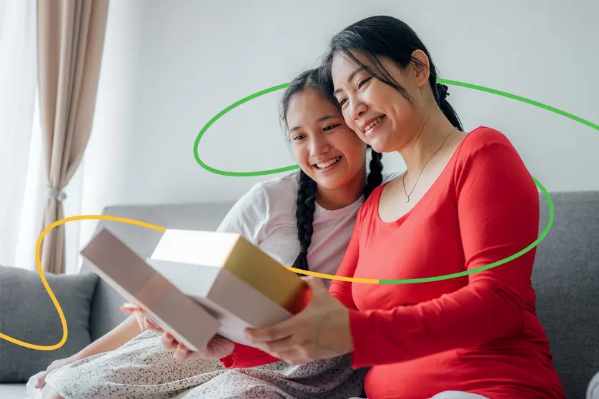 An image of someone receiving a gift from a loved one.