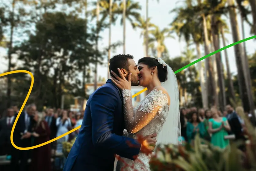 An image of newlyweds kissing on their wedding day.
