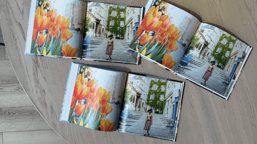 Mixbook photo books showcasing different paper finishes, cover options, and book formats.