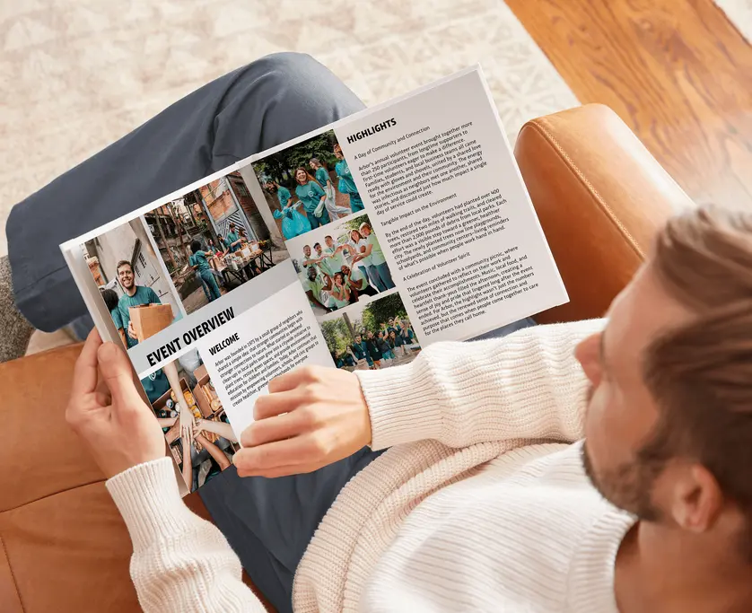 person holding a corporate book