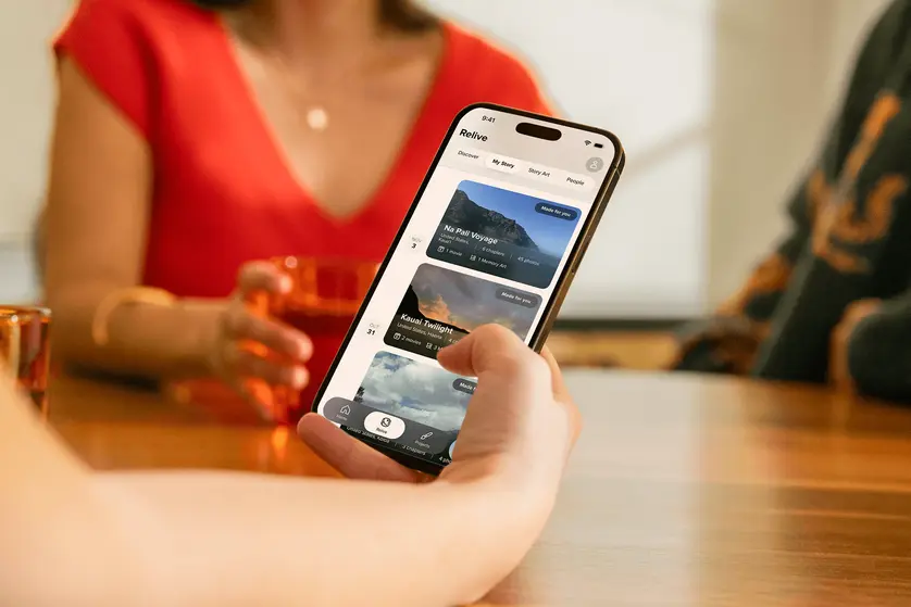 Mixbook app organizing iPhone photos into memories and Stories