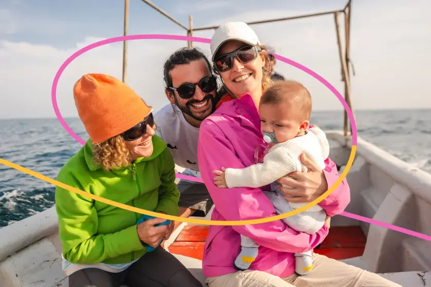 A family poses for a picture on a boat.